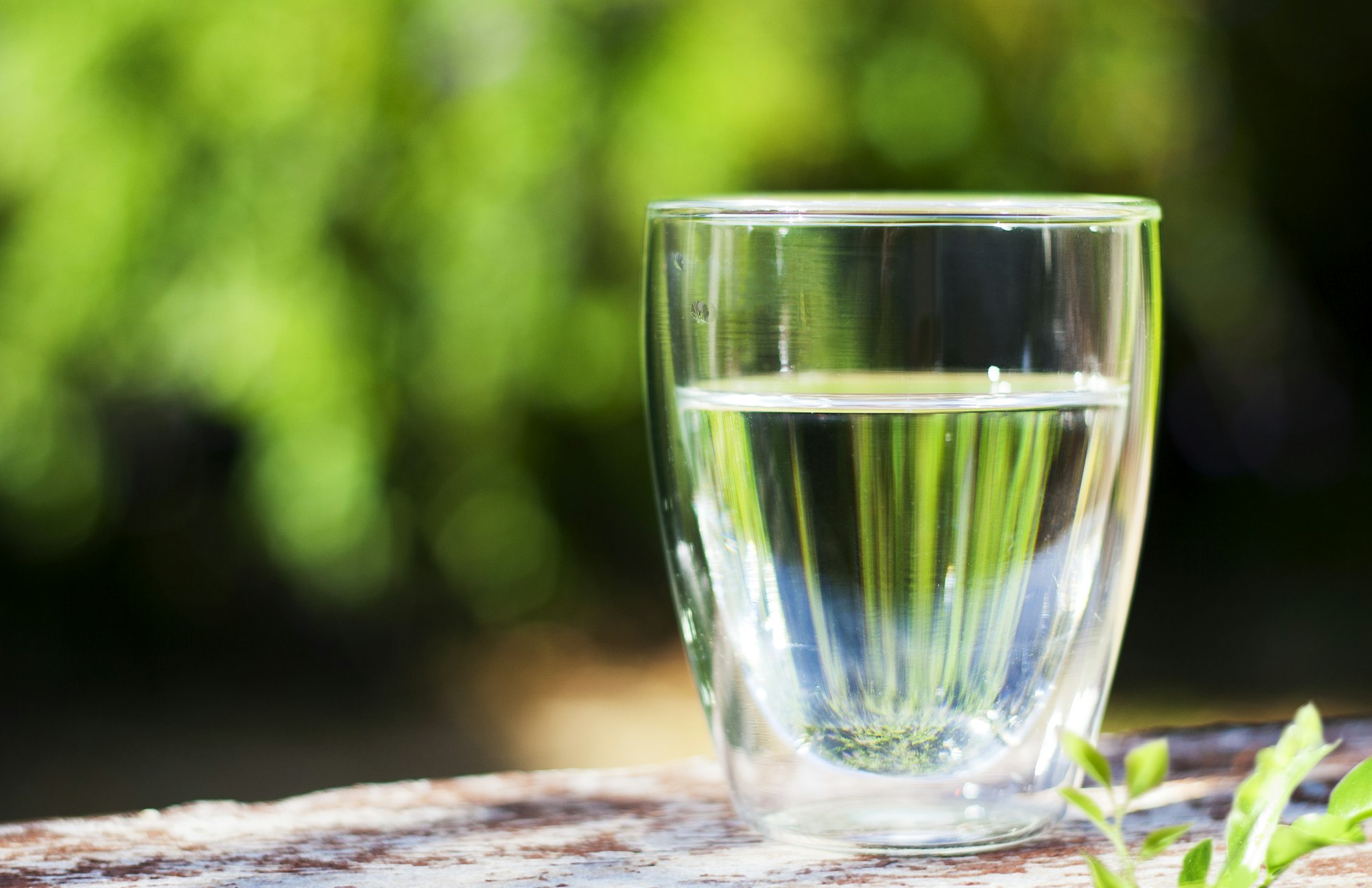Glass of water on the wooden table
